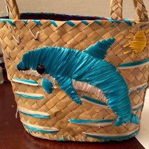 Handmade seagrass dolphin bag